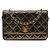 Wallet On Chain Cartera on chain Chanel de piel de cordero iridiscente acolchada dorada con botón tartan Dorado