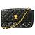 Borsa a tracolla con catena Chanel Matelassé Nero