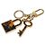 Louis Vuitton Portefeuille Confidence Keychain Marrone D'oro