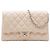 Clutch Chanel trapuntata in caviale beige con tracolla a catena