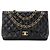 CHANEL - Borsa a tracolla Classic/Timeless Jumbo Chanel in pelle liscia nera Nero