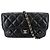 Borsa a tracolla Chanel Matelassé con patta da donna Nero Bianco