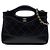 Borsa Shopping 31 Chanel in vitello lucido matelassé Nano Nero