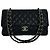 Borsa a tracolla CHANEL Double Flap Matelassé Coco Mark in pelle caviar Nero