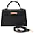 Hermès HERMES Kelly Mini Tasche aus schwarzem Leder - 103841