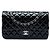 Borsa a tracolla Chanel Medium Classic Double Flap in vernice nera Nero