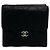 Cartera tri-fold Chanel Matelassé Coco Mark de piel de cordero negra Negro