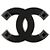 Spilla Chanel CC in smalto nero e ottone