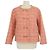 Chaqueta Chanel de tweed melocotón con detalles de botones CC