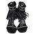 Sandali T-Strap Saint Laurent in pelle nera con borchie e frange Nero