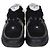 Sneakers basse Chanel in mesh e pelle CC Nero/Bianco