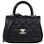 Mini borsa Chanel Coco Top Handle in pelle caviar matelassé nera Nero