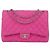 Borsa Chanel Maxi Classic Double Flap in pelle caviar matelassé e nubuck rosa
