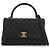 Borsa Chanel Coco Top Handle Medium in pelle caviar matelassé nera Nero