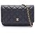 Borsa a tracolla Chanel Matelassé in pelle d'agnello nera Nero