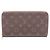 Cartera larga redondeada Louis Vuitton Zippy Organizer Monogram Castaño