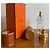Estojo de perfume Hermès Amazone em couro marrom e metal dourado - vista 9