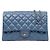 Chanel Borsa a tracolla con catena e patta in pelle caviar blu