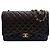 Chanel Bolsa Classic Flap em pele de cordeiro com ferragens douradas Maxi Preto