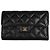 Cartera tri-fold Chanel en piel de becerro granulada negra Negro
