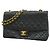 Chanel Matelassé Schultertasche Schwarz