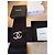 Broche Logo CC Chanel Negro Gold hardware - vista 3