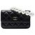 Clutch Chanel in vitello matelassé nero con Maxi Pearls e catena