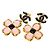 Orecchini Chanel Coco Mark con motivo floreale Nero Rosa D'oro