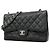 Chanel Schultertasche aus schwarzem genarbtem Kalbsleder