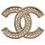 Spilla Chanel CC placcata oro con strass D'oro