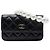 Borsa a tracolla Chanel Maxi Pearls in vitello matelassé nero con catena e clutch