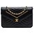 Borsa a tracolla Chanel Wallet on Chain in lambskin nero con matelassé chevron invertito