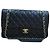 Chanel Borsa Classic Medium Flap in pelle d'agnello con catena dorata Nero
