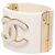 Bracciale rigido Chanel CC in resina dorata D'oro - vista 2