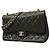Borsa a tracolla Chanel in vitello martellato nero