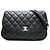 Borsa a tracolla con catena Chanel in pelle d'agnello nera Nero