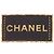 Spilla logo Chanel placcata in oro e pelle D'oro