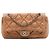 Borsa a tracolla Chanel CC trapuntata in vitello goffrato marrone con patta