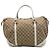 Borsa Boston Gucci in tela GG beige con Horsebit e borchie