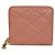 Cartera compacta Yves Saint Laurent Cassandra Rosa Beige