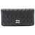 Cartera larga bi-fold Miu Miu Matelassé Negro