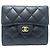 Portafoglio compatto tri-fold Chanel Matelassé Coco Mark Nero