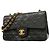 Borsa a tracolla Chanel Matelassé in pelle d'agnello nera Nero