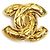 Broche en métal doré Chanel