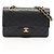 Chanel Matelassé Double Flap Schultertasche Schwarz