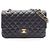Timeless Chanel Matelassé Double Flap Schultertasche Schwarz