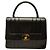 Borsa Chanel Mademoiselle Kelly Top Handle in pelle d'agnello nera Nero