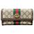 Cartera larga de piel Gucci Ophidia Castaño