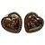 Boucles d'oreilles Chanel coeur doré
