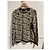 Top in maglia broccato oro e nero Rochas con maniche lunghe D'oro